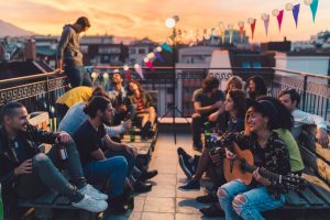 Friends drinking rooftop party